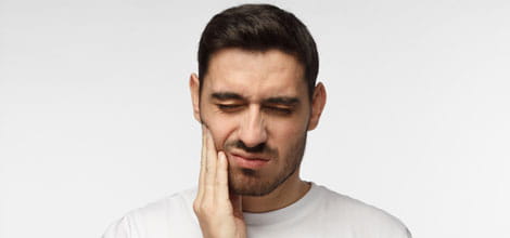 man with toothache